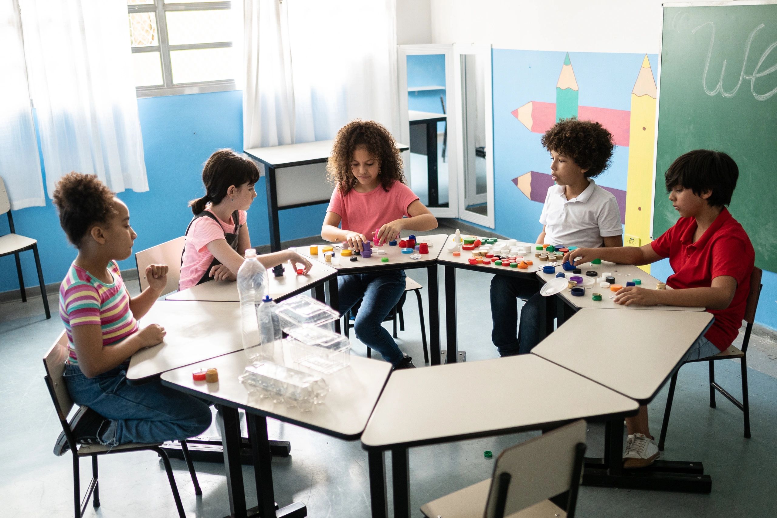 Children doing a hands-on classroom activity together