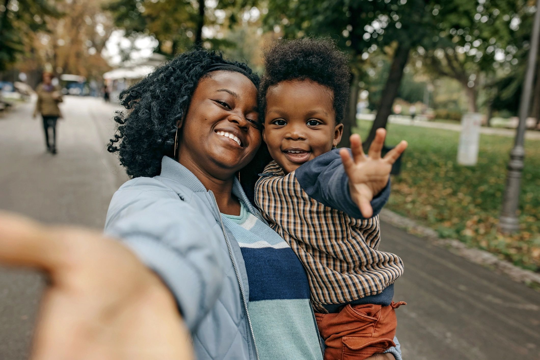 Parent hugging a child
